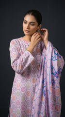 Close-up portrait of a model in a soft lilac pastel medallion lawn suit adjusting antique gold drop earrings, matching lilac tropical star floral chiffon dupatta draped across the chest, dark studio background