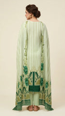 Close-up of the neckline and placket on a mint luxury lawn kameez showing the bold emerald green vertical placket with intricate white lace trim, oversized teal watercolour rose placement print, and emerald embroidered cuff border, matching striped lawn dupatta with teal rose print visible alongside, warm bokeh background