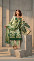 Full length front view of a smiling model walking through a lush Mughal garden with arched pavilions in a mint luxury lawn suit with fine vertical stripe print, oversized teal watercolour rose placement print, emerald green placket with white lace trim, emerald embroidered cuff border, sweeping emerald embroidered hem panel, plain mint cigarette trousers, and matching striped lawn dupatta with teal rose print and emerald floral border billowing in the breeze