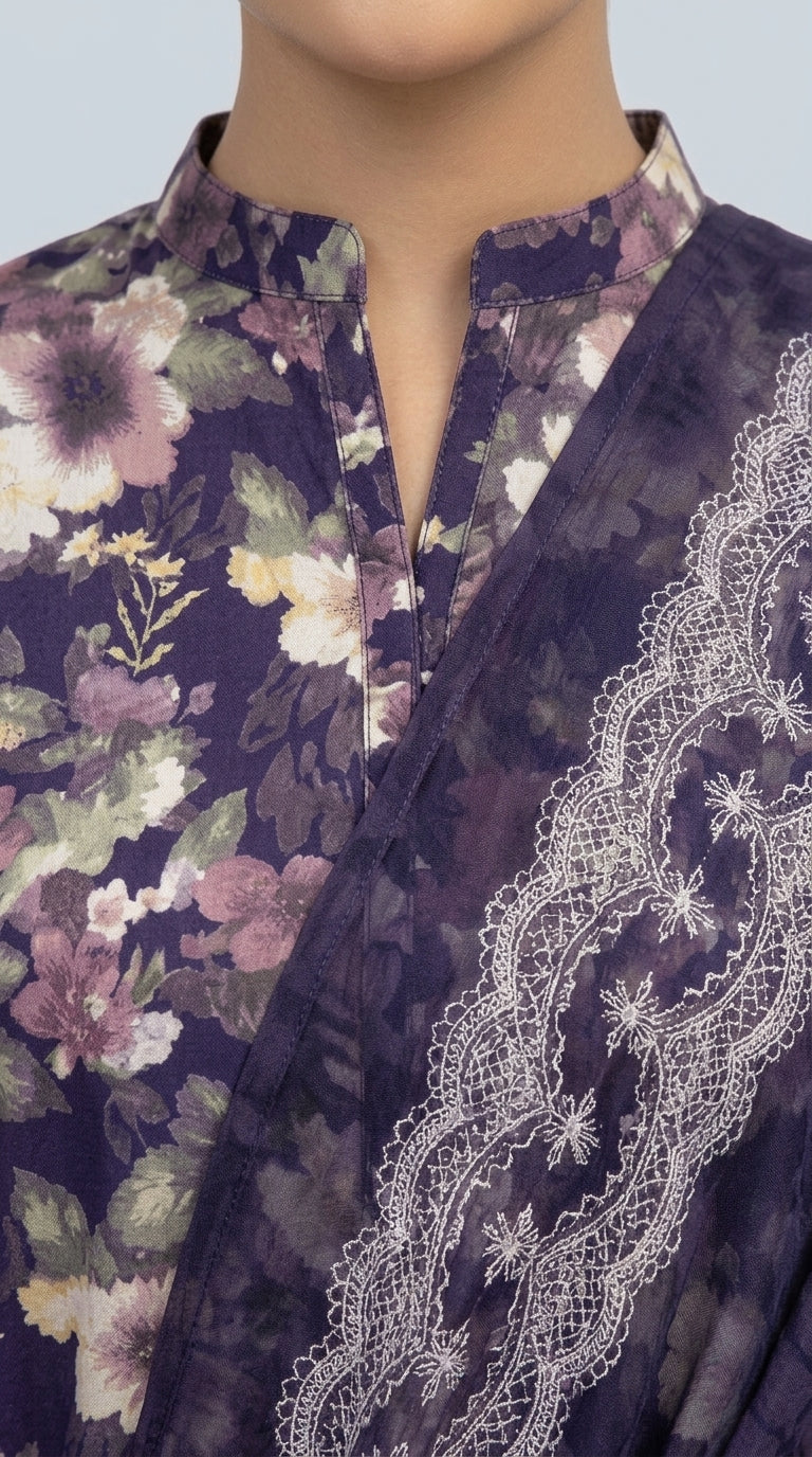 Close-up of the V-notch neckline with button placket on a royal indigo luxury lawn shirt with all-over watercolour floral print in mauve and ivory, matching indigo chiffon dupatta with bold silver lace border panel draped alongside