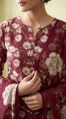 Close-up detail of the V-notch neckline with knotted button placket on a deep wine burgundy luxury lawn shirt with all-over ivory and blush rose print, matching sheer organza dupatta draped alongside