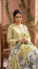 Detail shot of the oversized ivory and grey peony floral print on a premium citrine yellow luxury lawn 3-piece unstitched suit